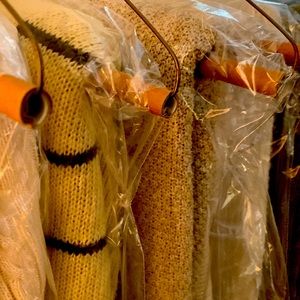 Great sweater for layering. Dry cleaned and ready for you!